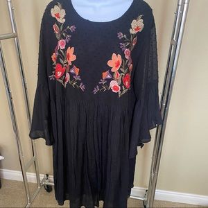 Embroidered black dress with bell sleeves